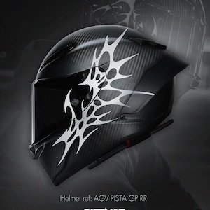 May include: A black motorcycle helmet with a carbon fiber weave pattern and a white tribal design. The helmet has a visor and the text "Helmet ref: AGV PISTA GP RR" and "DISTINCT." is visible.