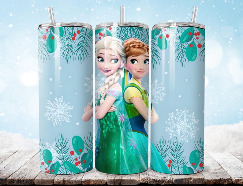 Puede incluir: Un vaso de acero inoxidable con Elsa y Anna de Frozen de Disney. El vaso tiene un fondo azul claro con copos de nieve y follaje de invierno. Los personajes visten sus trajes caracter&iacute;sticos. Incluye una pajita transparente.