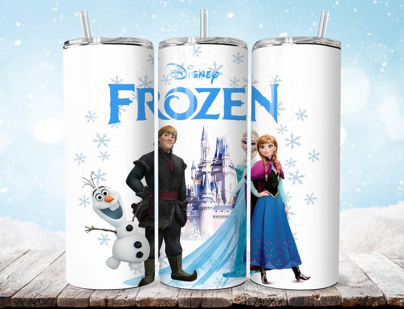 Puede incluir: Vaso aislado blanco con personajes de Frozen de Disney. El vaso tiene el logo azul "Frozen" e im&aacute;genes de Olaf, Kristoff, Elsa y Anna. El dise&ntilde;o incluye copos de nieve y una pajita plateada.