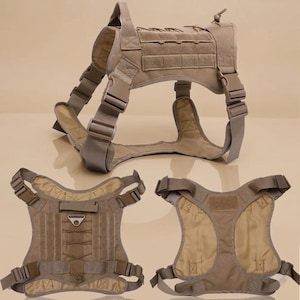 May include: A tan dog harness featuring multiple straps, buckles, and Velcro panels. The design includes a padded interior and robust construction. The image presents the harness from various angles, showcasing its features and build.
