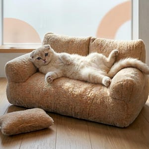 Un elegante sofá para gatos y perros pequeños. Cama versátil para todas las estaciones. Una cama moderna y mullida.