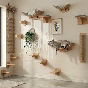 May include: A wall-mounted cat tree featuring wooden platforms, a rope ladder, and a scratching post. Two cats are seen resting on the platforms. The cat tree offers a space for cats to climb, play, and relax, enhancing their environment.