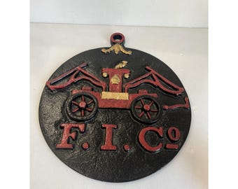 Placa de hierro fundido con el número 377 de la compañía de seguros para bomberos F.I. Co.