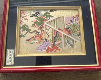 Brocado Nishijin bordado en seda japonesa que representa una escena de la era Heian.