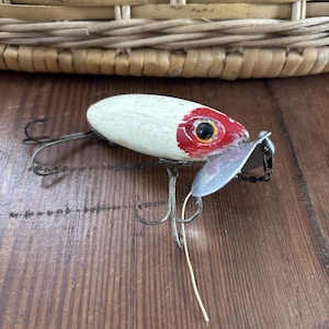 antique abrogast fishing lure Vintage Fred Arbogast Luminous Jitterbug For Sale busting sound created by the Jitterbugs special lip Arbogast Jointed Jitterbug Red White