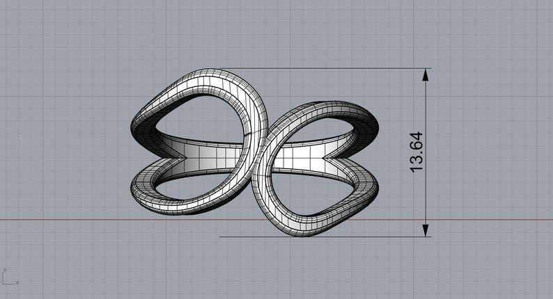 May include: A digital wireframe model of a ring featuring two interlocking, curved, loop-like shapes. The structure is rendered in black lines against a gray grid background. A vertical dimension line indicates a height of 13.64 inches.