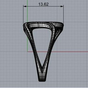 May include: A black and white digital wireframe model of a ring with a V-shaped design. The top section of the ring features a measurement line indicating a width of 13.62 units. The structure is composed of a grid of lines on a gray background.