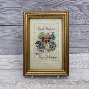 May include: A set of three ceramic mugs with a speckled, matte finish. The mugs are in shades of cream, light grey, and dark grey. Each mug has a simple, minimalist design, ideal for coffee or tea.