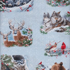 May include: A blue fabric with a wintery pattern featuring bears, wolves, deer, raccoons, and cardinals. The fabric has a snowy background with red berries and pine branches.