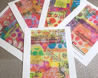 May include: Four digital collage prints with a colourful, abstract design featuring a mix of textures, patterns, and text. The prints are on white paper and have a digital download watermark.