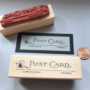 Tampon en caoutchouc monté sur bois de carte postale