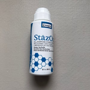 One StazOn or Ranger Stamp Cleaner for Rubber Stamps
