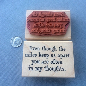 May include: Two wooden blocks with the text "Even though the miles keep us apart you are often in my thoughts." printed on them. The top block has the text in a distressed font.