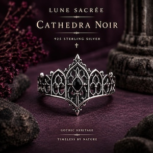 May include: A 925 sterling silver ring featuring an intricate, pointed architectural design with a central black stone. The text LUNE SACRÉE, CATHEDRA NOIR, 925 STERLING SILVER, GOTHIC HERITAGE, and TIMELESS BY NATURE is visible in the image.