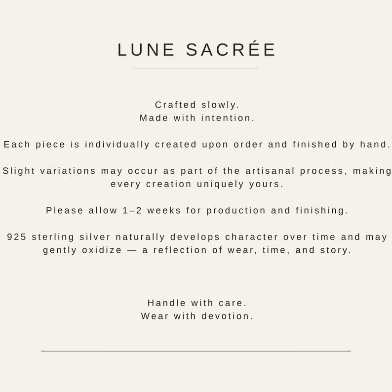 May include: A beige informational card with black text that reads: LUNE SACR&Eacute;E, Crafted slowly. Made with intention. Each piece is individually created upon order and finished by hand. 925 sterling silver naturally develops character over time.