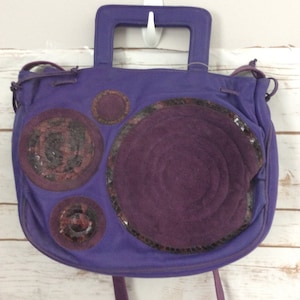 May include: A rustic wooden sign with the text "Welcome to our home" in white lettering. The sign features a distressed finish and a simple, inviting design, perfect for a front porch or entryway.