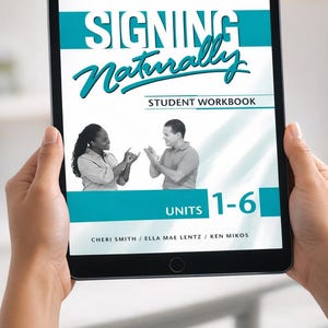 May include: A tablet displaying the cover of a "Signing Naturally" student workbook. The cover features the title in teal and a cursive font, with images of people signing. The workbook covers Units 1-6.