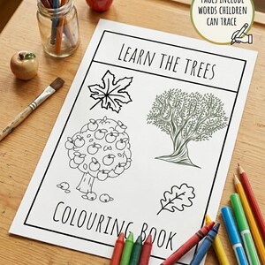 May include: A printable coloring book titled "Learn the Trees" with illustrations of trees and leaves. The book includes the text "Pages Include Words Children Can Trace" and "Instant Download". Colored pencils and crayons are scattered around the book.