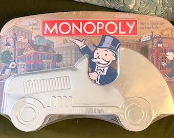 Vintage 2001 Monopoly game in car tin (unopened)