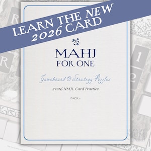 May include: A white card with a blue border and text that reads "LEARN THE NEW 2026 CARD" and "MAHJ FOR ONE". The card also says "Gameboard & Strategy Puzzles" and "2026 NMJL Card Practice".