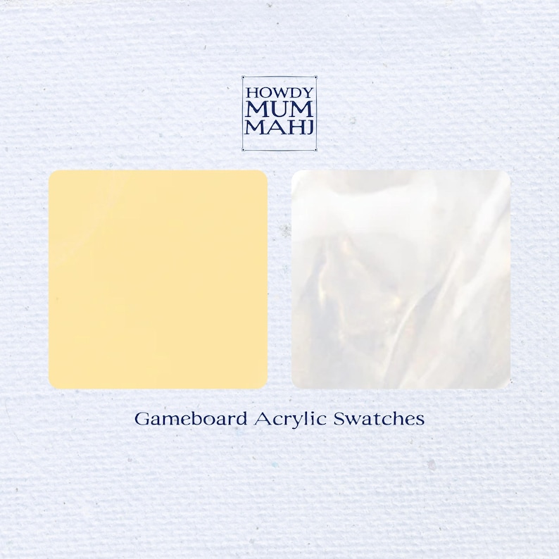 May include: Two acrylic gameboard swatch samples. One is a square of pale yellow, the other is a square of pearlescent white. The text "HOWDY MUM MAHJ" is in a square box at the top, and "Gameboard Acrylic Swatches" is below.