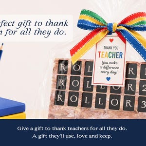 Image displays an acrylic gameboard packaged beautifully in cellophane wrapping and a primary color ribbon, stack of books, and colored pencils. Words "perfect gift to thank them for all they do." Image shares that the gameboard is a great gift idea for teachers, father's day, graduation.
