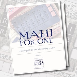 May include: A white paper titled "MAHJ FOR ONE" with blue text, a simple guide for solo mahjong practice. The image shows a mahjong set and the text "ROLLOR" and numbers. Designed by HOWDY MUM MAHJ.