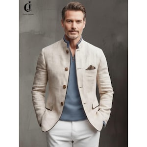 May include: A beige linen jacket with a mandarin collar, brown buttons, and a small pocket square. The jacket is worn over a light blue sweater and paired with white pants. The image includes the text "Corvis Jackets".