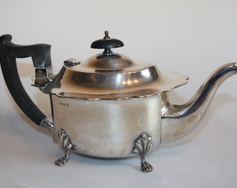 Ms. Sainsbury-Seale Pours - Vintage 1930s Art Deco Silver Plated Teapot w/Black Bakelite Handle