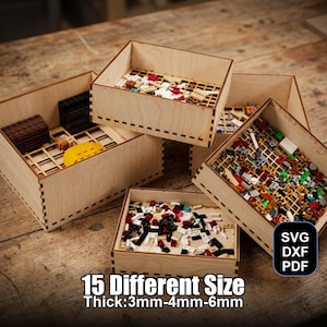Puede incluir: Varias cajas de almacenamiento de madera sin terminar, algunas llenas de bloques de construcción de juguete de colores. Las cajas son de varios tamaños y tienen un interior en forma de rejilla. El texto de la imagen dice "15 Different Size Thick: 3mm-4mm-6mm".