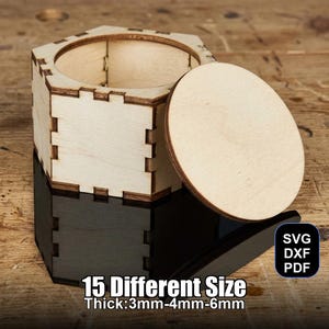 May include: A wooden box with a hexagonal body and a circular lid, laser-cut from light-coloured wood. The edges are darker. The image includes text: "15 Different Size Thick: 3mm-4mm-6mm".