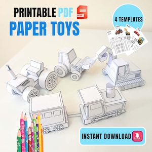 Peut inclure: Des jouets en papier PDF imprimables représentant des véhicules de chantier et un train. L'image contient le texte "PRINTABLE PDF PAPER TOYS" et "INSTANT DOWNLOAD". Des crayons de couleur sont au premier plan et des modèles en arrière-plan.