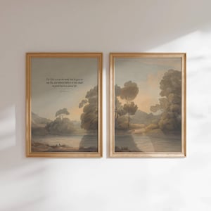 May include: Two framed landscape prints in gold-toned frames. The left print features a river scene with trees and the text: For God so loved the world, that he gave his only Son, that whoever believes in him should not perish but have eternal life.