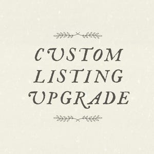 May include: A square graphic with a light cream-colored background featuring the dark brown text "CUSTOM LISTING UPGRADE" centered in a serif font. The text is framed by two small, symmetrical decorative leaf branch illustrations above and below.