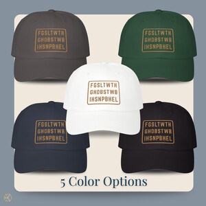 Five embroidered dad hat colorways flat lay; dark grey, green, black, navy, white, john 3 16 bible verse cipher gold thread Christian baseball cap faith hat