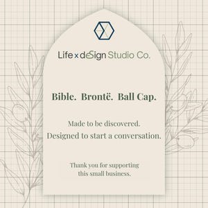 The image is a graphic design featuring a text box with a floral pattern and a geometric shape above it. The text box contains a message about a business called "Bible. Brontë. Ball Cap." and expresses gratitude for supporting the business.
