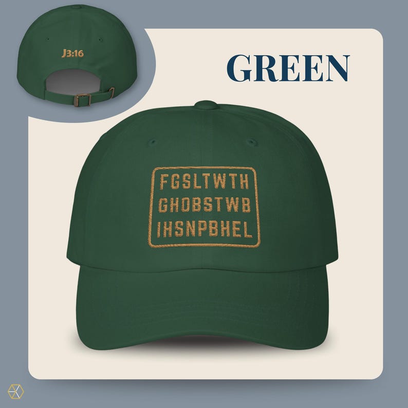Green baseball cap with the text "GREEN" and "J3:16". The front of the cap features a gold rectangular design with the text "FGSLTWTH GHOBSTWBI HSNPBHEL". The cap has an adjustable strap.