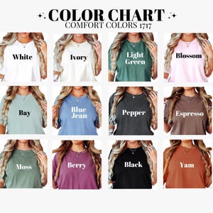May include: A colour chart showcasing Comfort Colours 1717 t-shirts in a range of shades. The chart includes colours such as white, ivory, light green, blossom, bay, blue jean, pepper, espresso, moss, berry, black, and yam. The text "COLOUR CHART" is at the top.