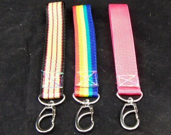 Wrist strap and  hinged ring