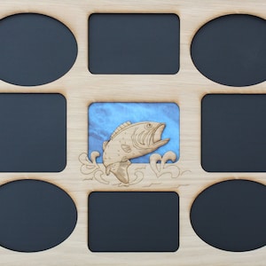 May include: A wooden picture frame with nine openings for photos. The center opening features a laser-cut design of a fish jumping out of the water. The frame is perfect for displaying memories of fishing trips.