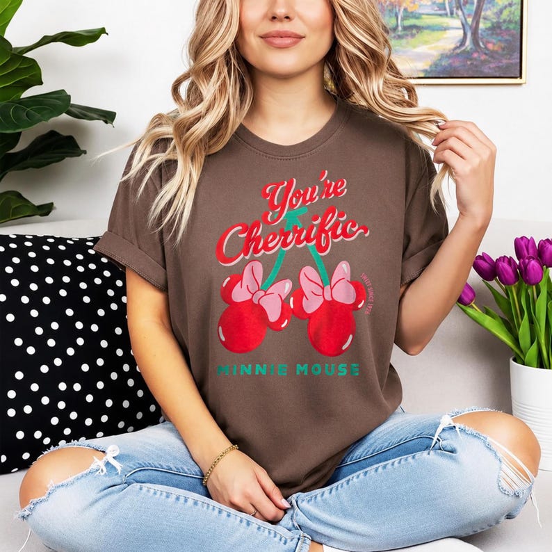 Retro cherry graphic t-shirt featuring a playful fruit design suitable for kids, teens, and adults. Comfortable unisex summer tee perfect for vacations, casual outings, summer activities, and everyday wear. Lightweight and soft fabric with fun, colorful cherry artwork. Ideal for gifting, playful summer wardrobe additions, or matching family outfits. Stylish and versatile graphic shirt for retro-inspired and casual summer fashion.