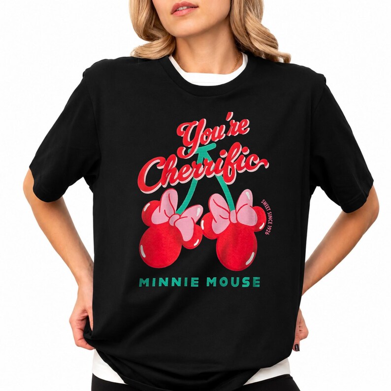Retro cherry graphic t-shirt featuring a playful fruit design suitable for kids, teens, and adults. Comfortable unisex summer tee perfect for vacations, casual outings, summer activities, and everyday wear. Lightweight and soft fabric with fun, colorful cherry artwork. Ideal for gifting, playful summer wardrobe additions, or matching family outfits. Stylish and versatile graphic shirt for retro-inspired and casual summer fashion.