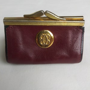 Monedero Vintage By Bosca de piel flor color burdeos