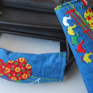 Luggage Handle Wrap Set of 2,garden  patterned on blue jeans background