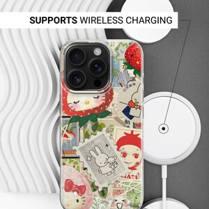 May include: Clear phone case with a collage of stamps, strawberries, and cartoon characters. The case has a clear border and the text "SUPPORTS WIRELESS CHARGING" and "SIDES ARE NOT PRINTED".