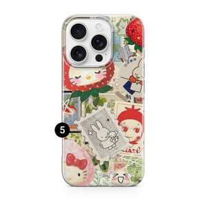 May include: Clear phone case with a collage design featuring cartoon strawberries, bunnies, and other cute illustrations. The case has a variety of stamps and a number 5 in a black circle.