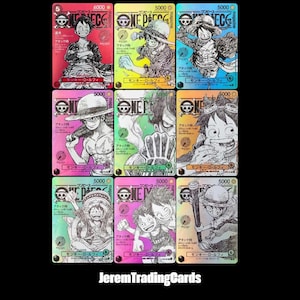May include: Nine trading cards with manga character illustrations. Each card shows a different image of the character in various poses, with Japanese text and the number 5000 or 6000. The cards are set against a black background.