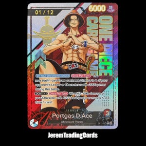 May include: A holographic One Piece trading card featuring Portgas D. Ace with a 6000 power level. The card displays the character in a hat, text detailing game mechanics, the Whitebeard Pirates emblem, and the label 01/12 in the top corner.