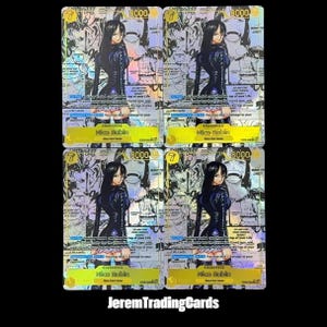Può includere: Quattro carte collezionabili con Nico Robin dall'anime One Piece. Ogni carta ha un design olografico con un ritratto del personaggio, il numero 7 e il numero 8000. Le carte hanno uno schema di colori giallo e argento.