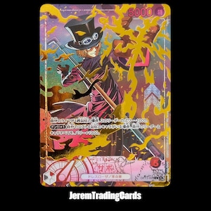 May include: A One Piece trading card featuring a character in a black top hat and purple coat holding a staff. The card has a holographic finish with gold flame-like overlays, the number 5000, and Japanese text detailing game mechanics.